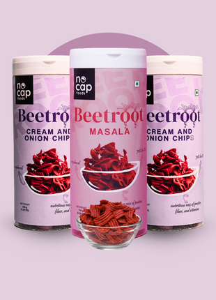 Three cans of 'no cap' beetroot chips on a light purple background