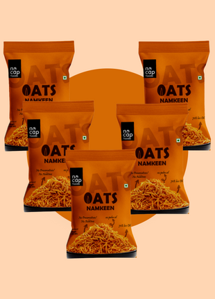 Five packages of Oats Namkeen on a peach background